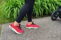 Feet wearing Nike Motiva Women