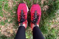 Feet wearing Nike Motiva Women