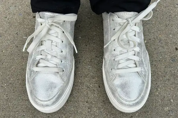 A person wearing Dr. Scholl