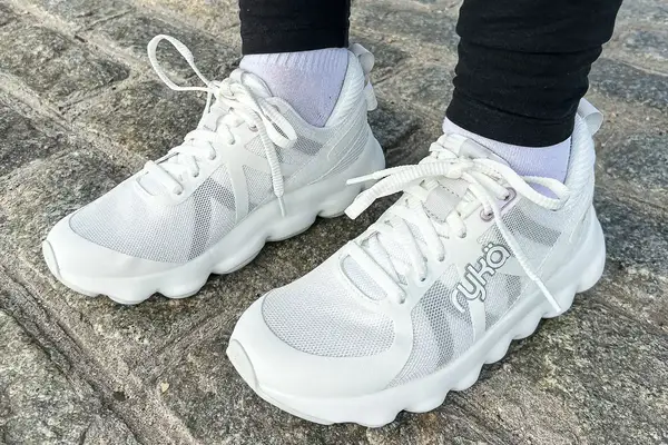 A woman wearing a pair of Rykä Women