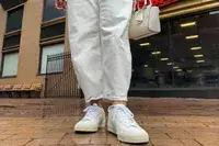 The front view of a person wearing the Veja Women