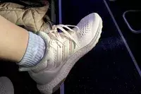A close-up of a worn Adidas Ultraboost 1.0 shoe