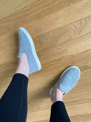 A person stands outside while wearing the Ryka Women