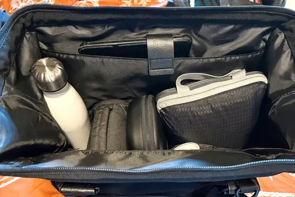 Travel items inside the Béis Mini Weekender