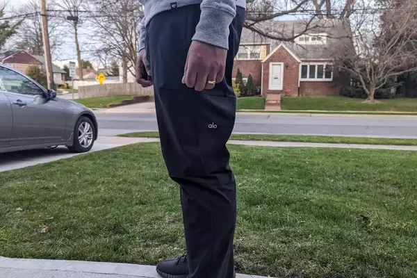 A side view of a person wearing the Alo Yoga Men