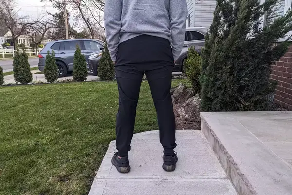 The back of a person wearing the Alo Yoga Men