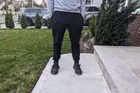 A front view of a person wearing the Alo Yoga Men