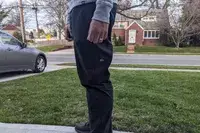 A side view of a person wearing the Alo Yoga Men