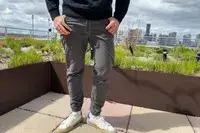 A person stands on a patio while wearing the Patagonia Men