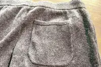A close-up of the pocket on the Quince Mongolian Cashmere Jogger