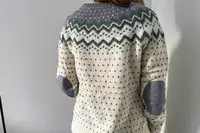 A person wearing the Fjallraven Ovik Knit Sweater