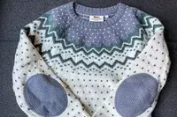 Fjallraven Ovik Knit Sweater on a grey surface