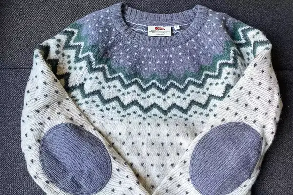 Fjallraven Ovik Knit Sweater on a grey surface