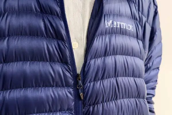 The logo and zipper on the Marmot Men