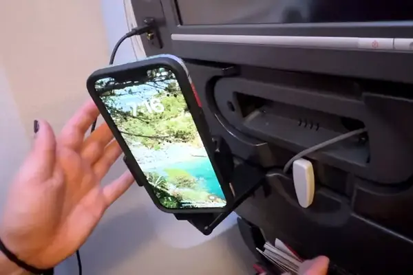 A phone in the Perilogics Universal In-flight Plane Holder Mount 