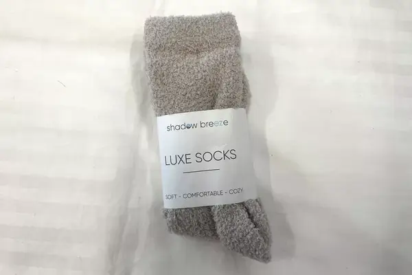 A pair of the Shadow Breeze Plush Cozy Knit Socks