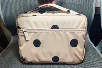 Person Holding Calpak Tablet Tech Organizer 