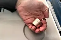 A person holding the PPFISH Portable Daily Pill Case