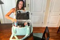 A person packs the RTIC 6-Can Everyday Cooler with drinks