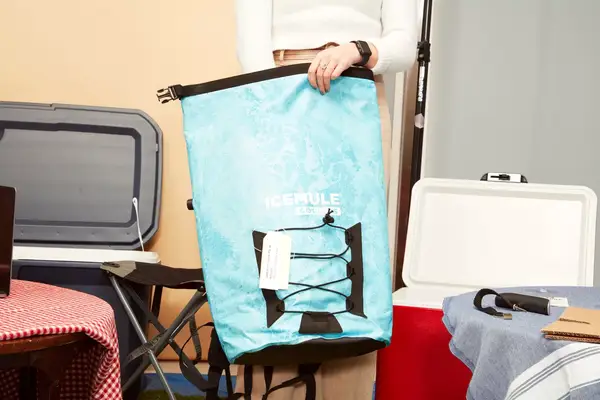 Canned soda and ice in the Stanley The All Day Julienne Max 30-Can Cooler