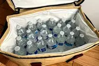 Bottled water inside the Snow Peak Soft Cooler 38