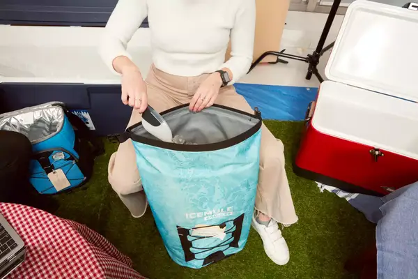 The Stanley The All Day Julienne Max 30-Can Cooler on a bench