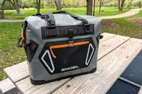 The Engel HD30 Heavy-Duty Soft-Sided Cooler Bag on a wooden table