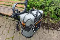 The Engel HD30 Heavy-Duty Soft-Sided Cooler Bag next to a park bench