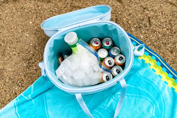Drinks and ice in the Hydro Flask 20L Carry Out Soft Cooler Travel Bag