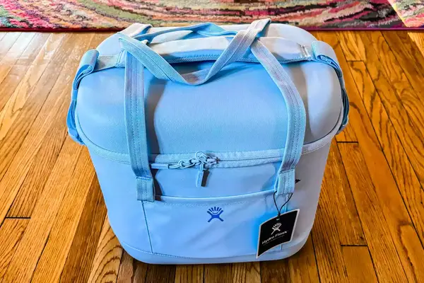 The Hydro Flask 20L Carry Out Soft Cooler Travel Bag with the tags on