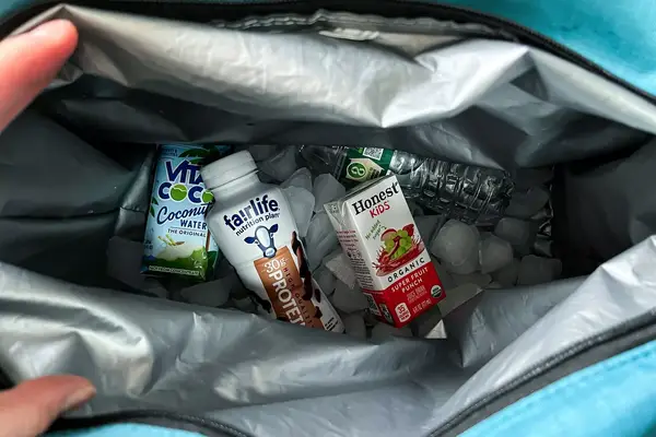 Drinks and ice inside the Igloo Latitude Snapdown 36-Can Cooler Bag