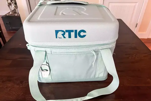The brand name and logo on the front of the RTIC 6-Can Everyday Cooler