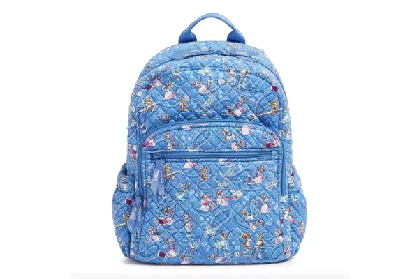 A person wears the Baggallini Nolita Convertible Backpack