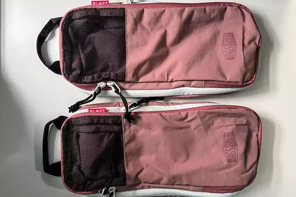 Two parts to the Blast 6PCS Compression Travel Packing Cubes on a white surface