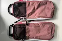 Two parts to the Blast 6PCS Compression Travel Packing Cubes on a white surface