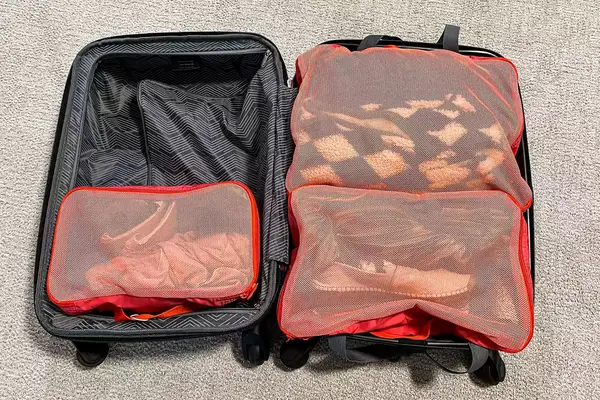 The Cram Packing Cubes packed in a suitcase