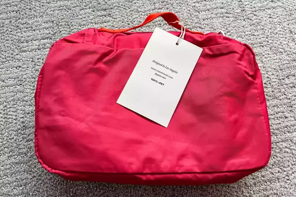 The back of a Cram Packing Cube with tags