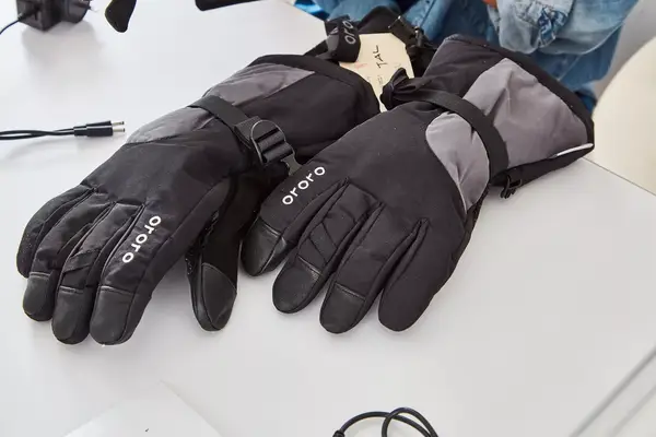 A close-up of the logo on the Gerbing 7V Hard Knuckle Battery Heated Gloves