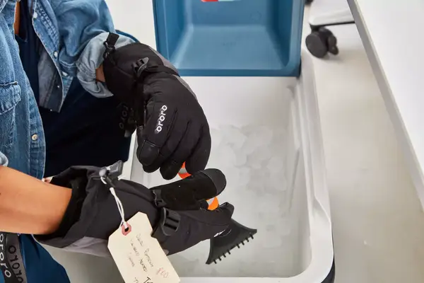 The Gerbing 7V Hard Knuckle Battery Heated Gloves while charging