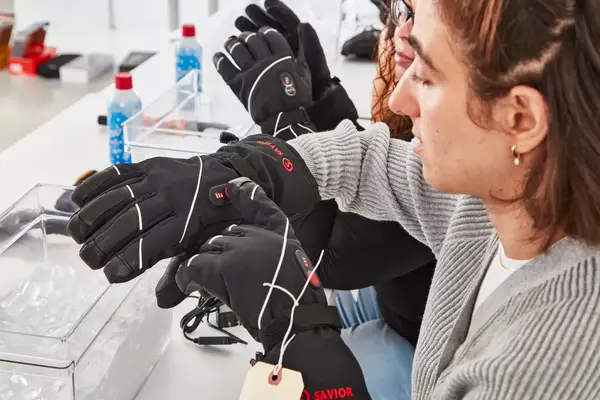 A person wearing the DAY WOLF Rechargeable electric gloves