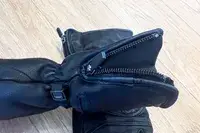 The zipper on the DAY WOLF Rechargeable electric gloves