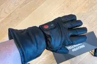 A person wears the DAY WOLF Rechargeable electric gloves