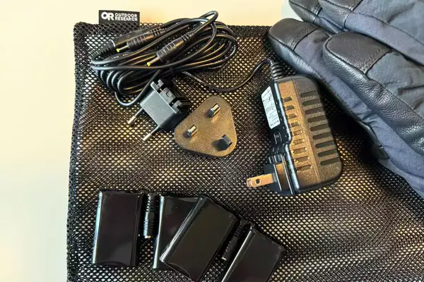 The chargers and adapter for the Outdoor Research Prevail Heated GORE-TEX Gloves