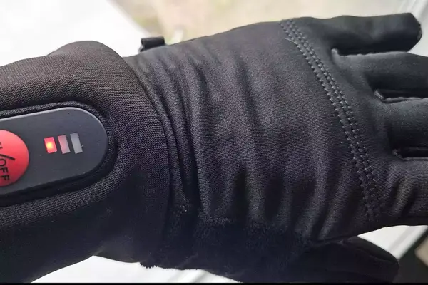 A person wears the SAVIOR HEAT Heated Glove Liners 