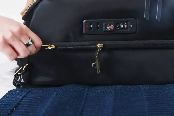 The lock and zippers on the side of the Tumi Voyageur Léger Compact Carry-on