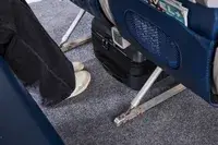 The Delsey Paris Cruise 3.0 2-Wheeled Underseater under an airplane seat