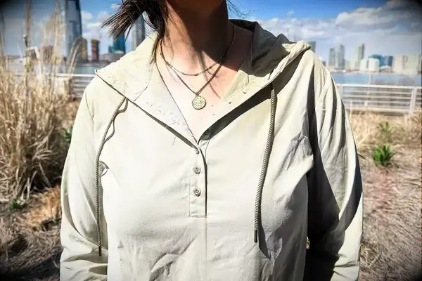 a close up of the buttons on the Hikerkind Trail Sun Hoodie 01