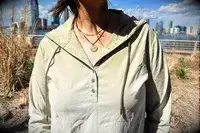 a close up of the buttons on the Hikerkind Trail Sun Hoodie 01