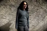 A person wearing the Paka The Hoodie