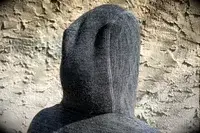 A person turned around wearing the Paka The Hoodie